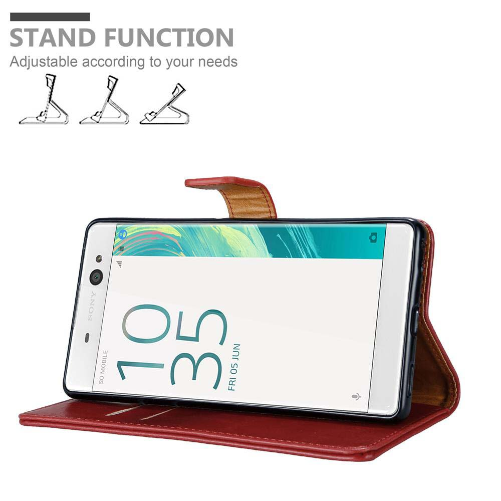 Telefono in custodia di pelle rossa. La custodia è aperta, schermo visibile.