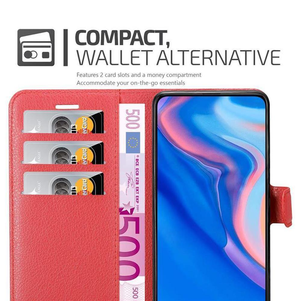 Custodia in pelle rossa con carte e denaro all'interno, telefono a destra.