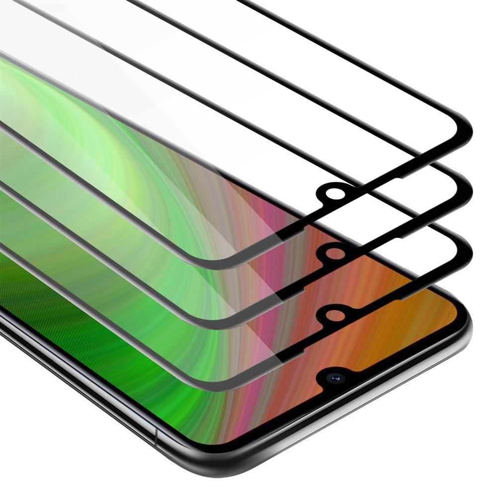 Uno smartphone con più protezioni schermo applicate. Il display ha sfumature verdi, rosa e arancioni.