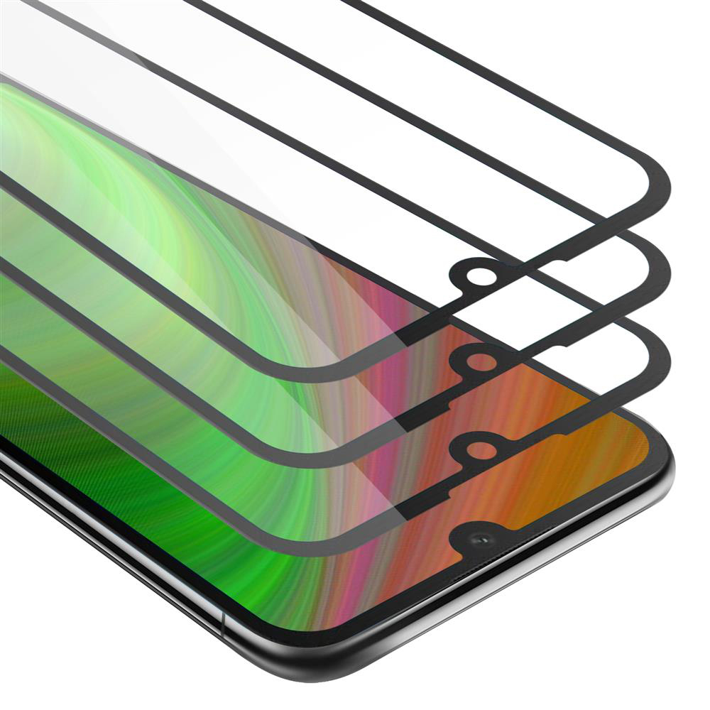 Tre protezioni per schermo, leggermente sovrapposte, con lo schermo di un telefono visibile attraverso di esse.