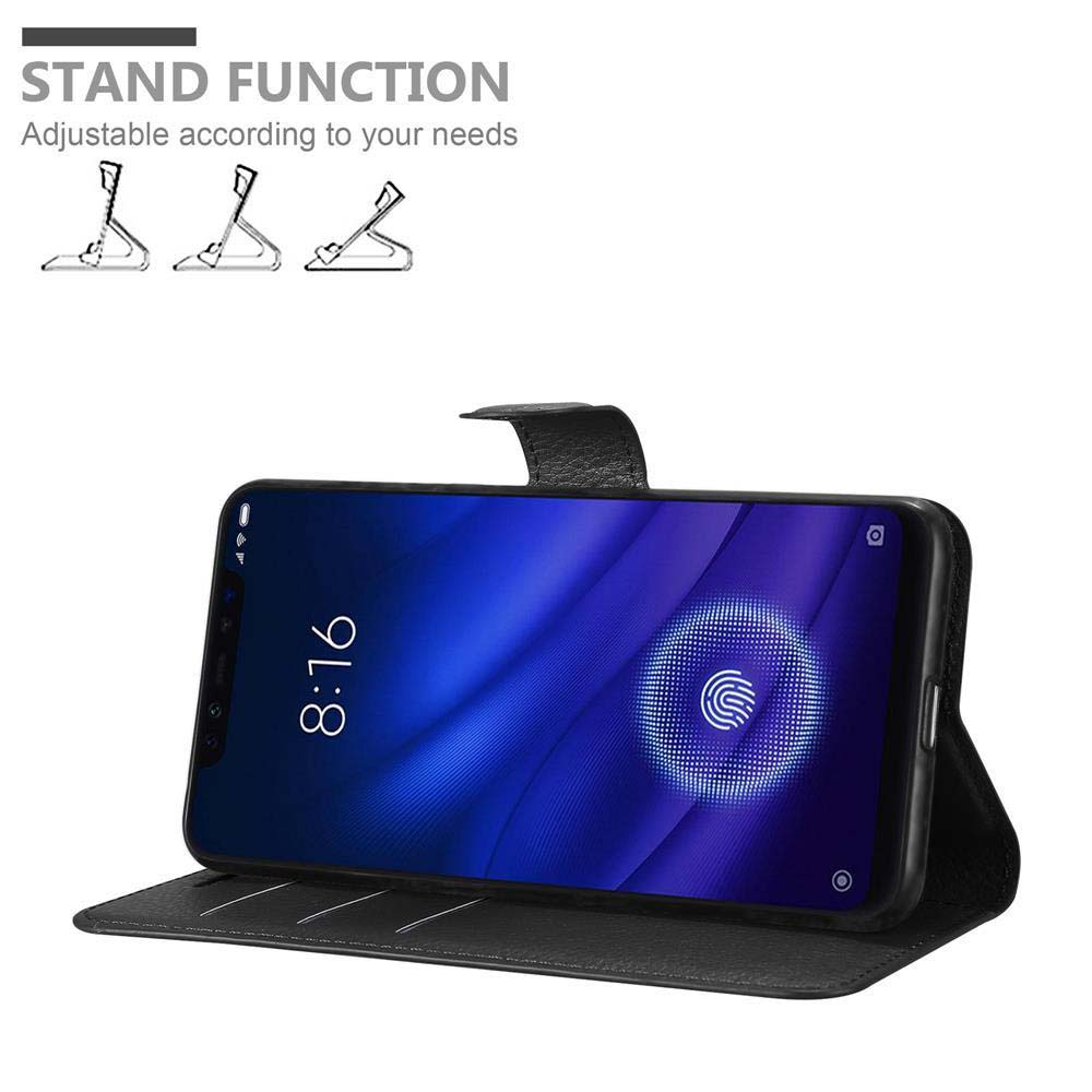 Ein Telefon in einer schwarzen Hülle, der Bildschirm zeigt die Uhrzeit. Über dem Telefon Symbole.