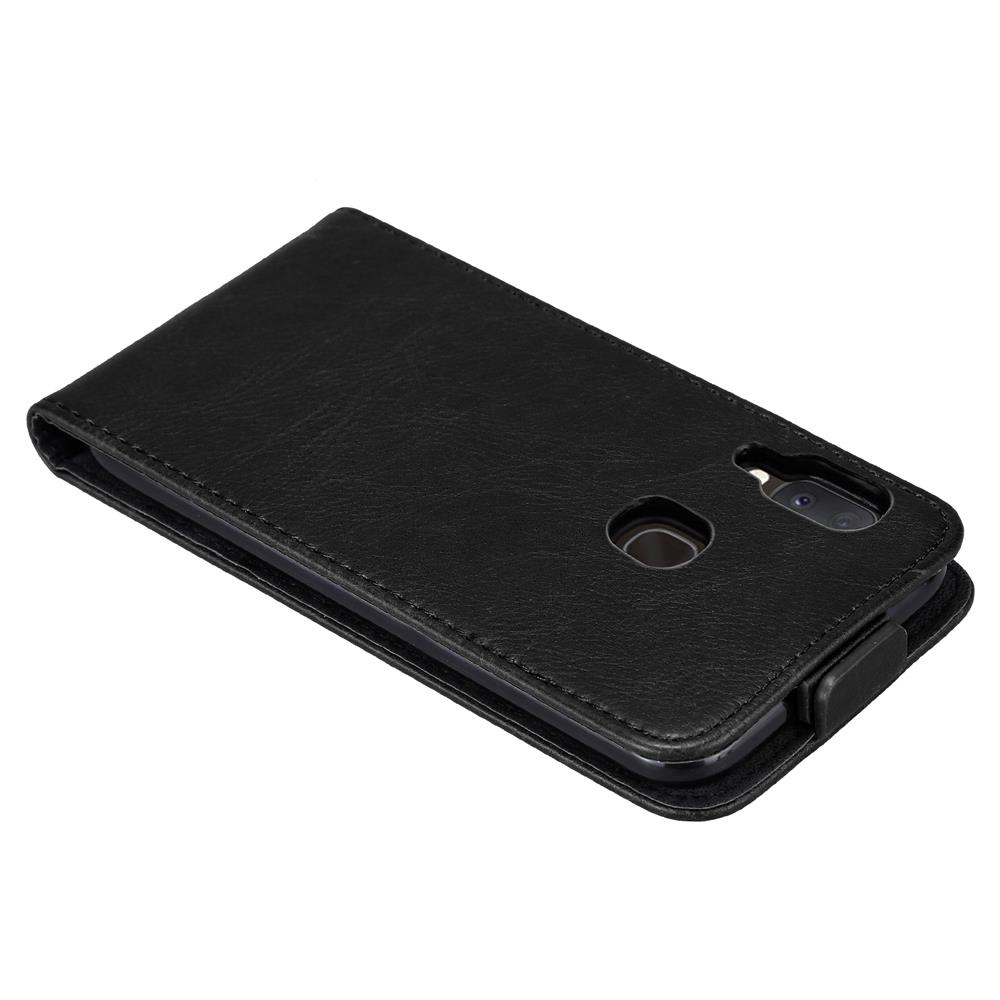Schwarze Flip-Handyhülle, geschlossen. Zeigt Telefon mit Doppel-Kamera.