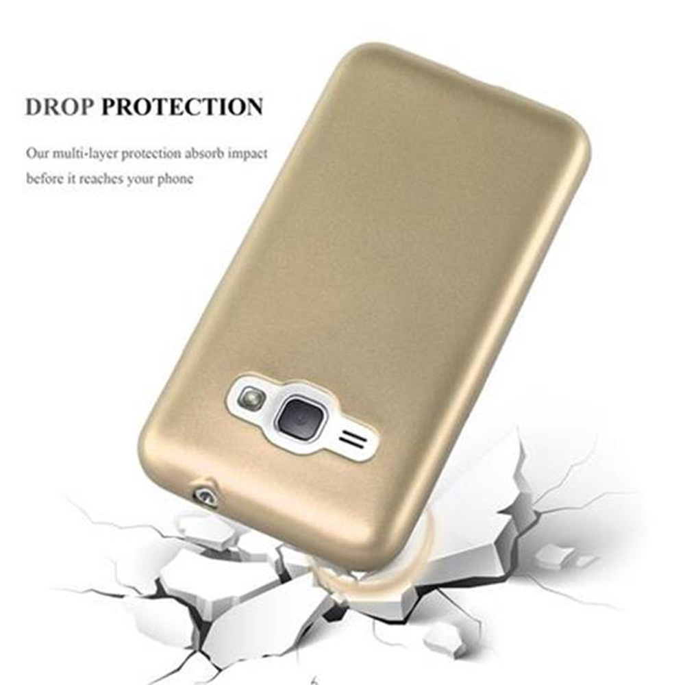 Funda de teléfono dorada con teléfono dentro, sobre superficie blanca rota. Texto: Protección contra caídas.