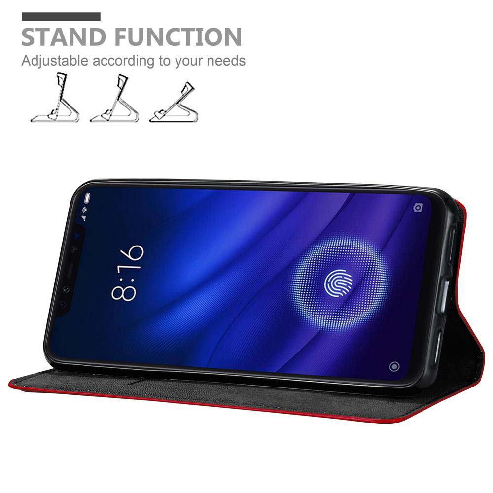 Telefon in schwarzer Hülle geöffnet. Es zeigt einen blauen Bildschirm. Text: 'Standfunktion'.