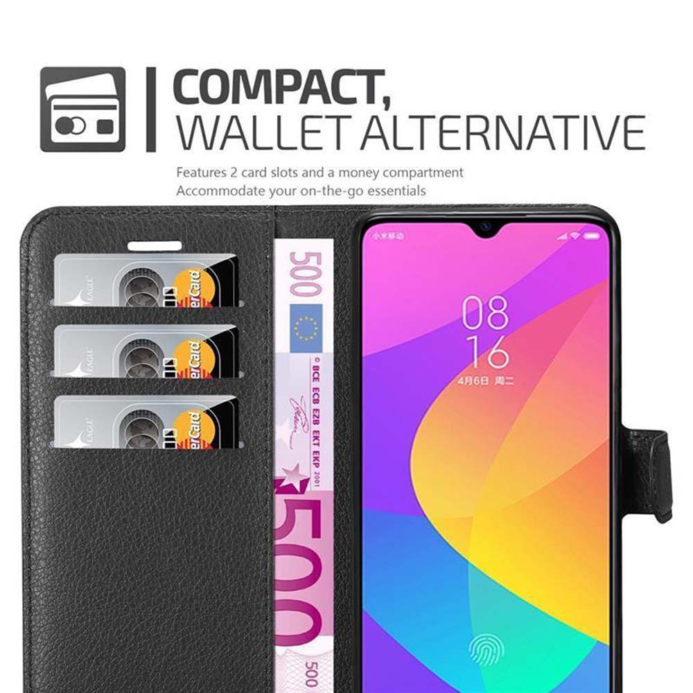 Custodia per telefono nera a portafoglio, aperta. Contiene un telefono, fessure per carte e una banconota.