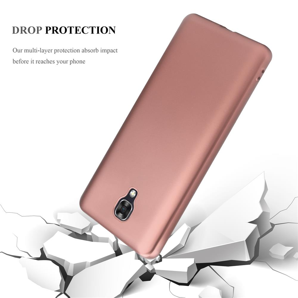 Custodia per telefono oro rosa. Sta cadendo su cemento bianco rotto. Il testo dice: Protezione dalle cadute.