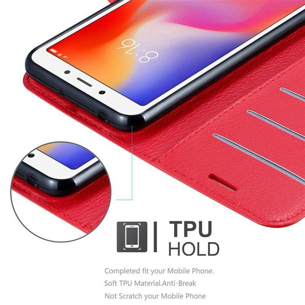 Rote Handyhülle. Ein Telefon zeigt die Uhrzeit an. Text lautet: TPU HALTEN.