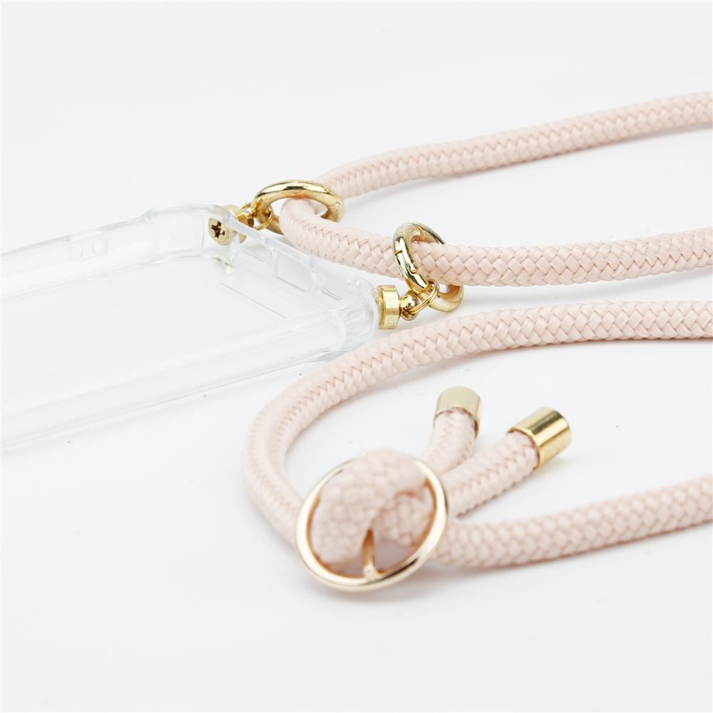 Custodia trasparente con cinturino intrecciato rosa e dettagli dorati. Sfondo bianco.