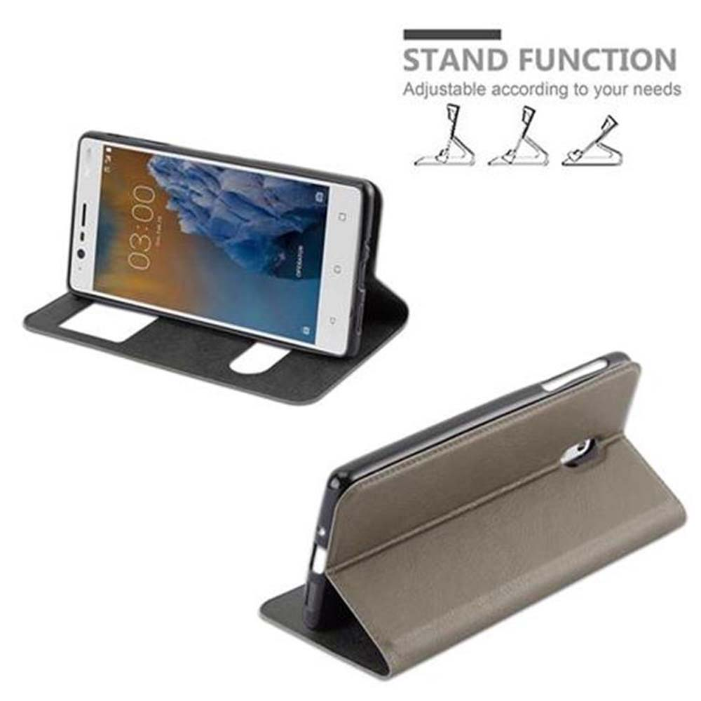Telefon in einer Hülle, kann alleine stehen. Standfunktion. Zwei Telefone gezeigt, eines in Gebrauch.