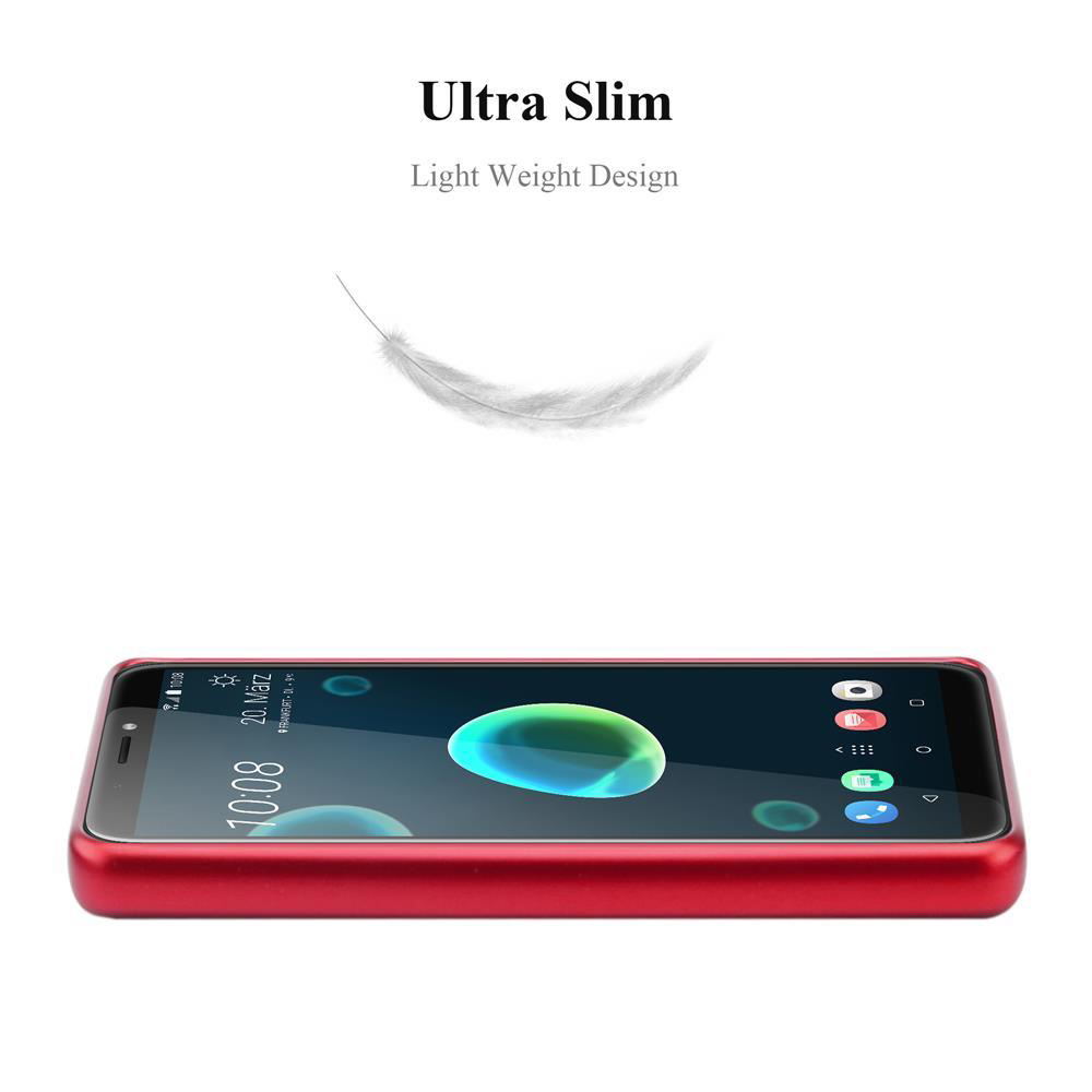 Telefono rosso in una custodia rossa. La custodia è in basso. Una piuma fluttua sopra il telefono.