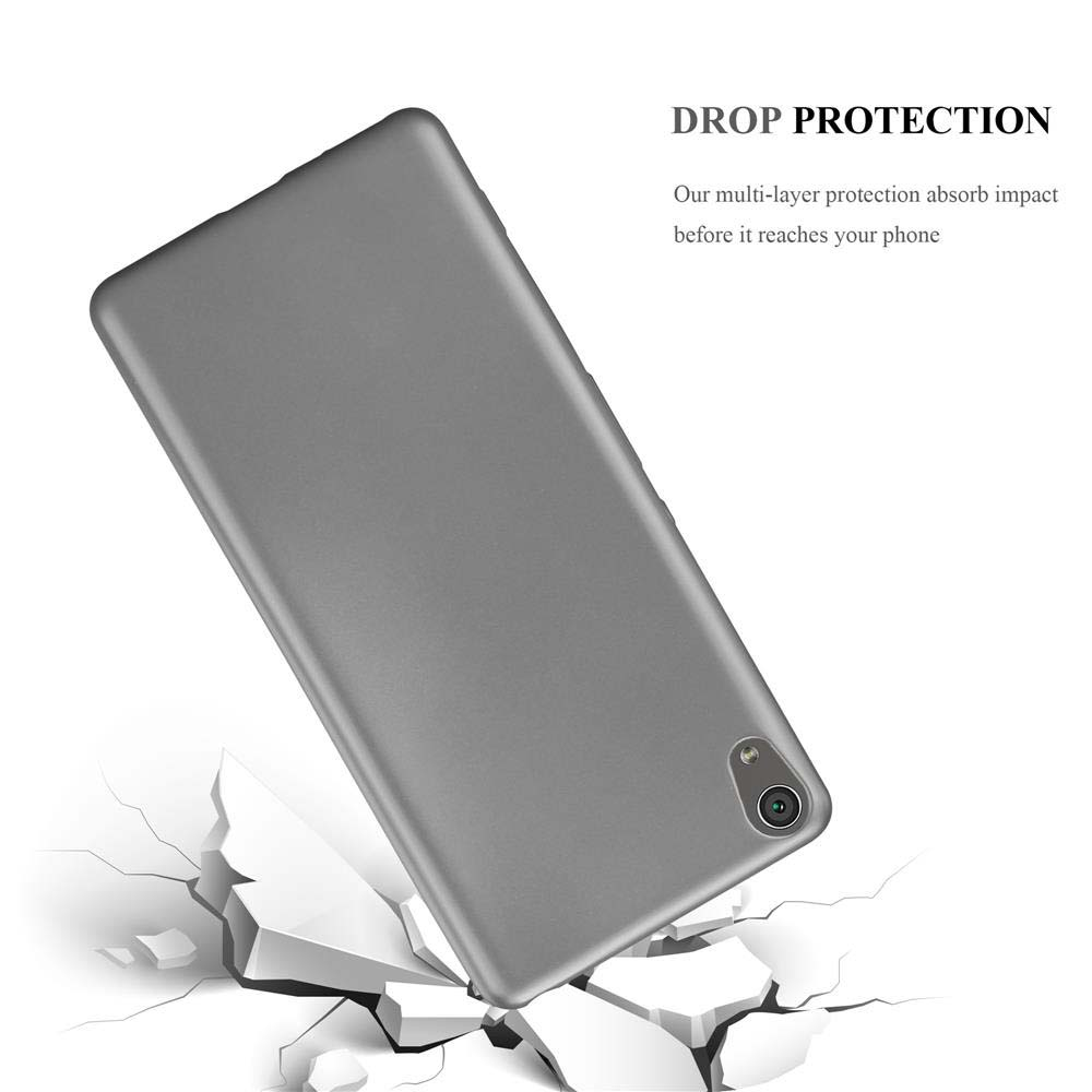 Una funda gris para teléfono cae y rompe una superficie blanca debajo.