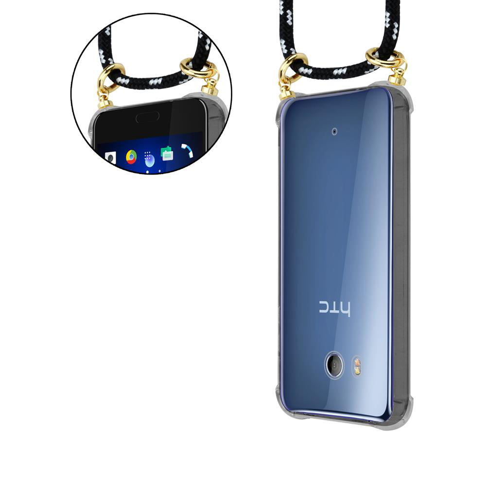 Telefon in klarer Hülle mit schwarz-weißem Band. HTC-Logo auf dem Telefon.
