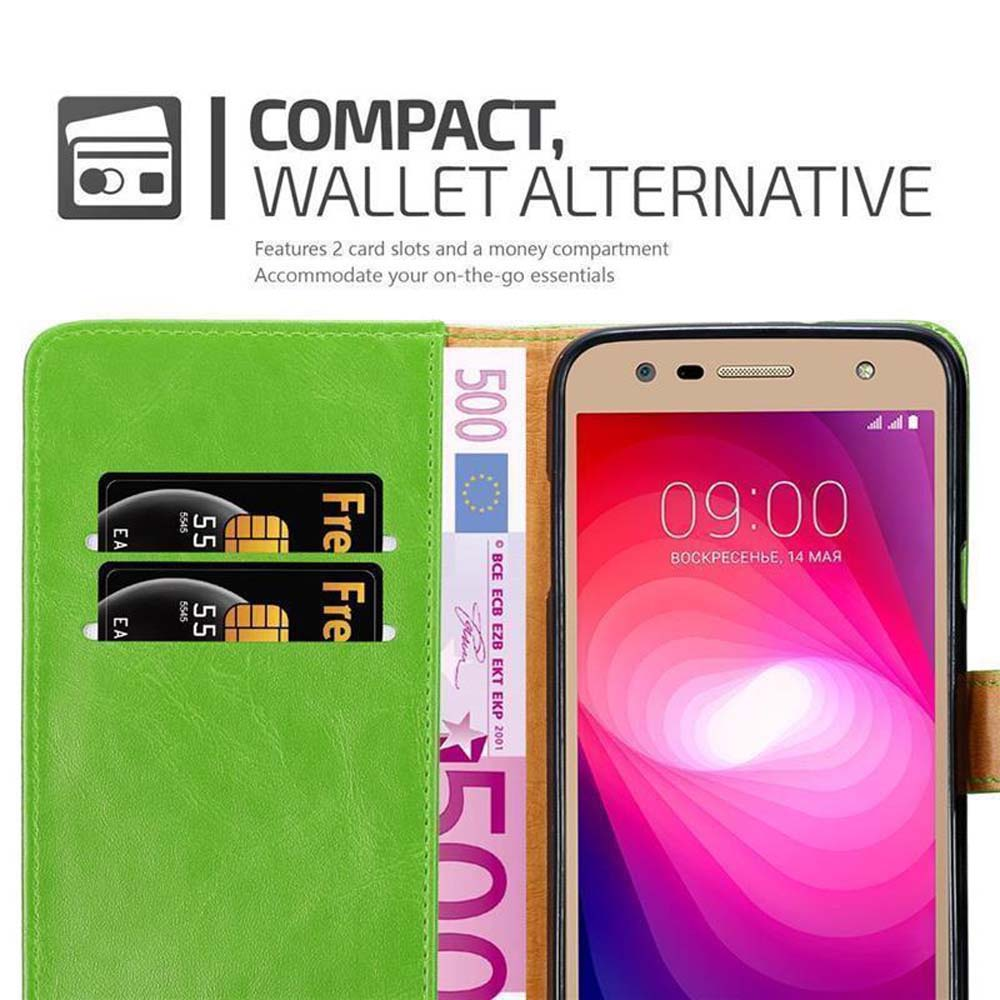 Custodia a portafoglio verde con fessure per carte e denaro. Un telefono mostra le 09:00.