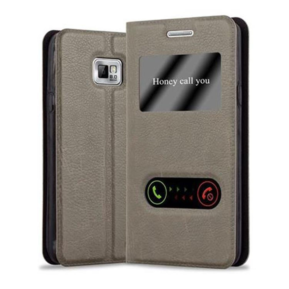 Funda de teléfono con tapa abatible que dice "Honey call you" en la pantalla.