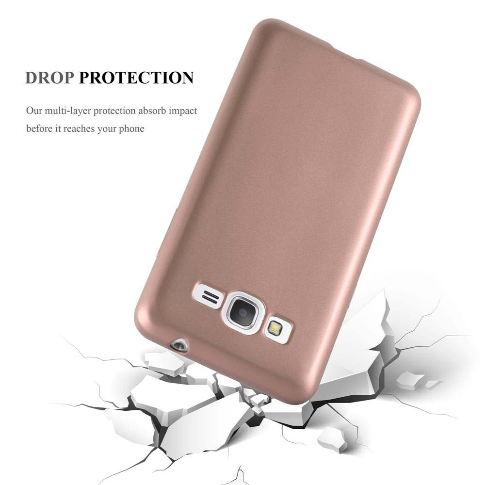 Funda de teléfono en oro rosa. Teléfono dentro. El teléfono está en el suelo agrietado.