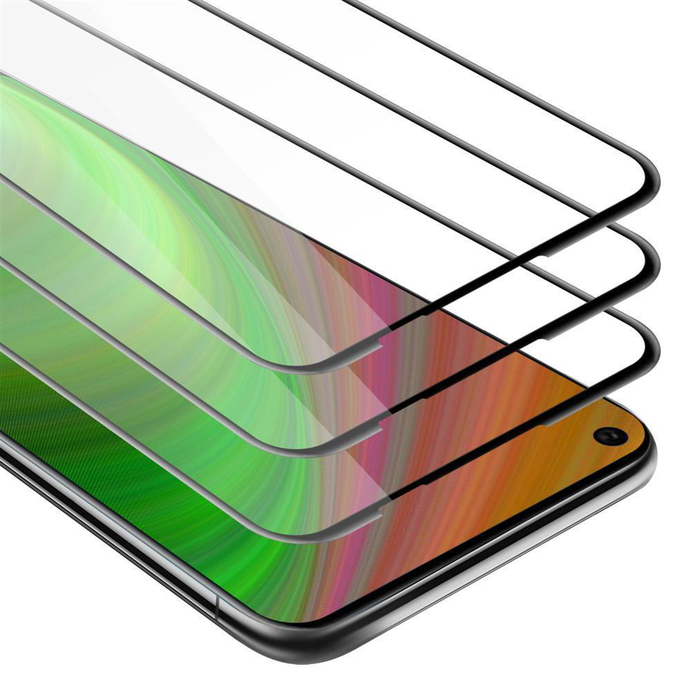 Tre protezioni schermo impilate su un telefono. Trasparenti e colorate.