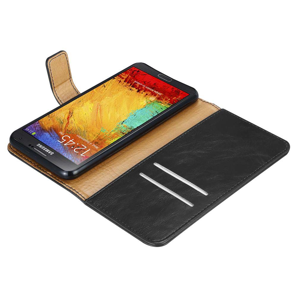 Teléfono en funda de cuero. La hora es 12:45. La funda está abierta.