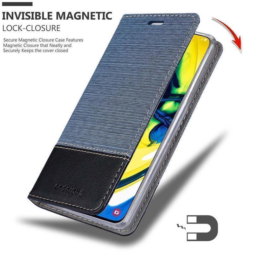 Custodia per telefono, parzialmente aperta. Il testo recita 'INVISIBLE MAGNETIC LOCK-CLOSURE'.