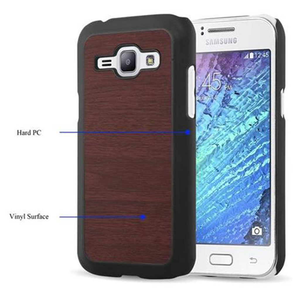 Custodia per telefono nera e legno accanto a un telefono.