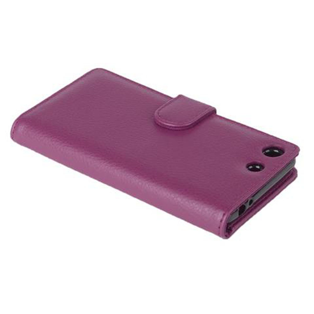 Funda de teléfono morada cerrada. La funda tiene un cierre de lengüeta. La parte trasera tiene dos orificios para cámara y flash.