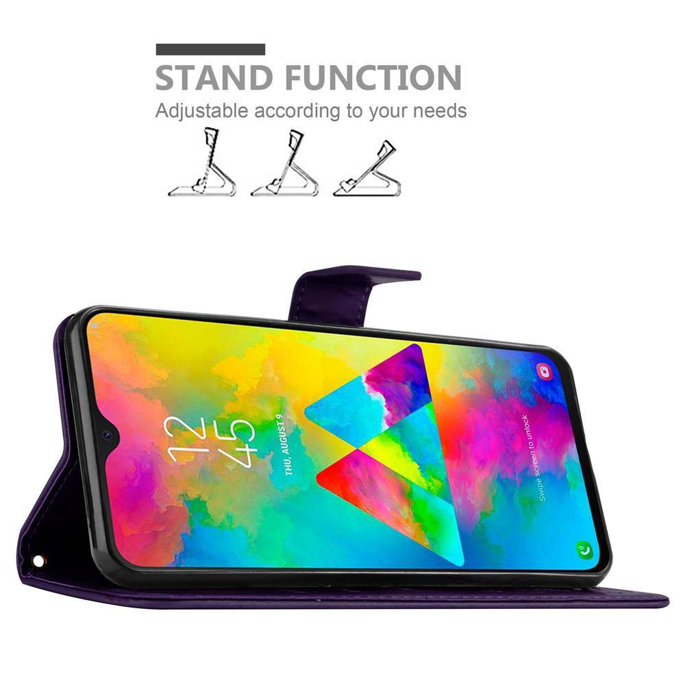 Un telefono in una custodia viola è aperto, con uno schermo che mostra un design colorato. La custodia è su un supporto.