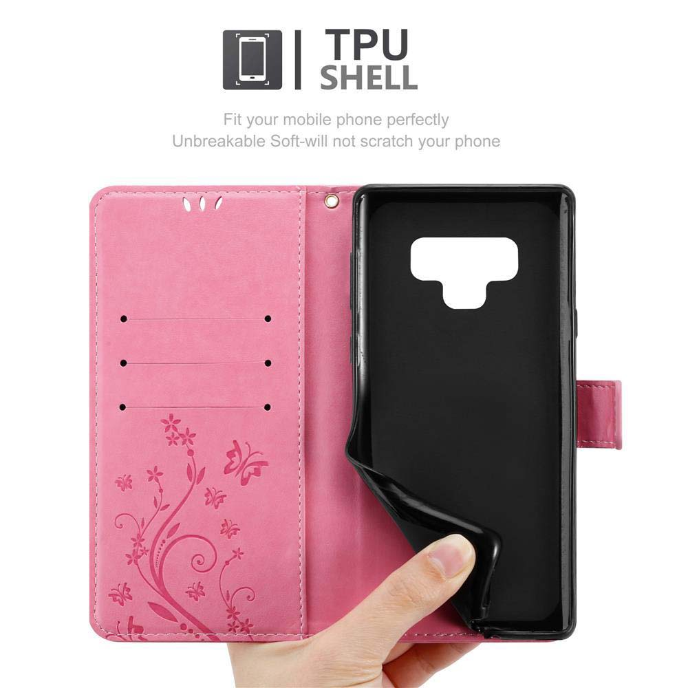 Una custodia per telefono rosa con un telefono all'interno. L'interno della custodia presenta motivi floreali.