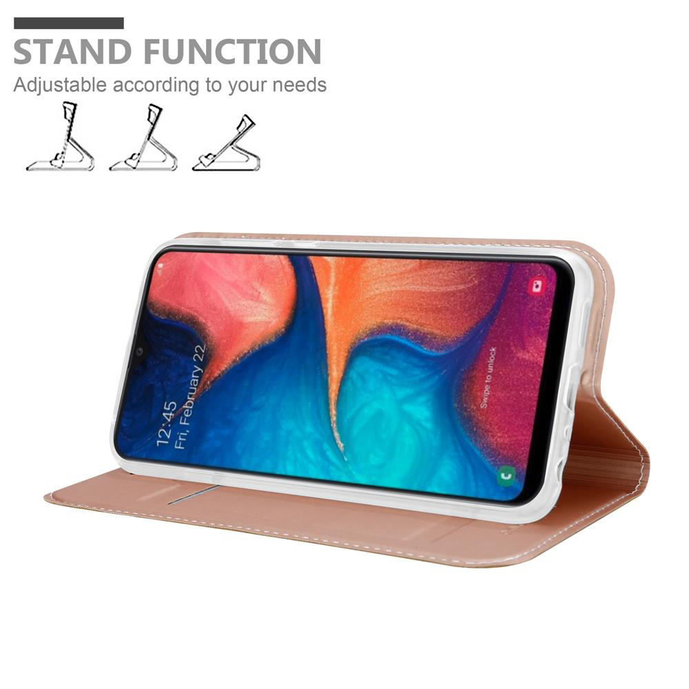 Ein Telefon in einem rosa Gehäuse wird in einer Standfunktion angezeigt. Das Telefon zeigt Uhrzeit und einen blauen Hintergrund.