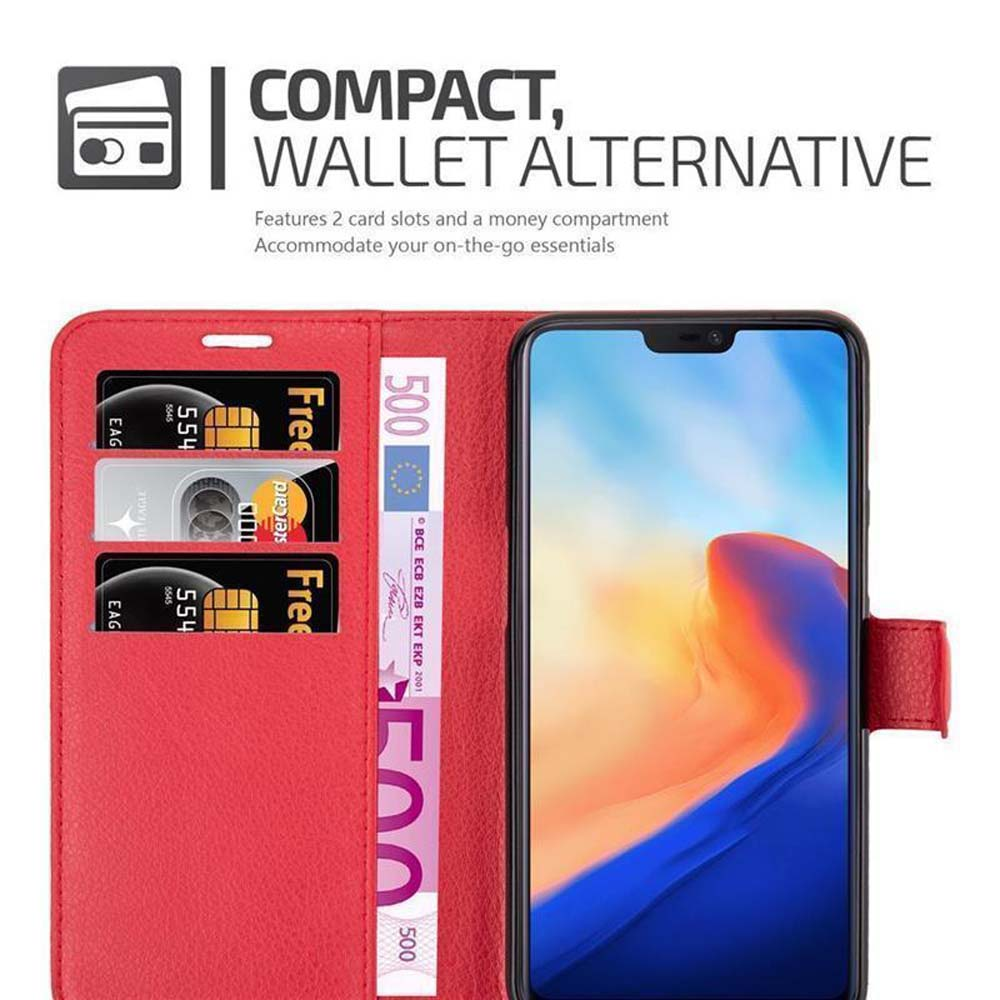 Custodia rossa per telefono aperta, carte di credito e denaro dentro, telefono dentro.
