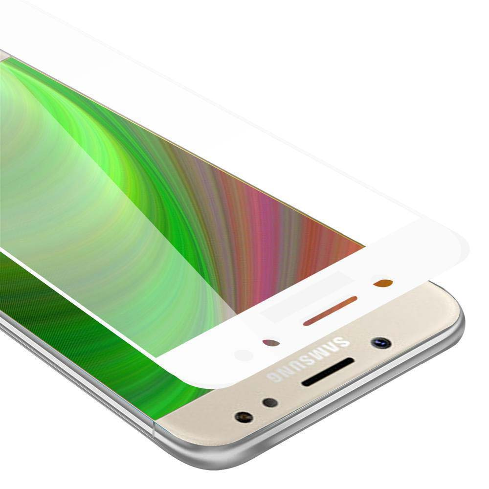 Un teléfono con un protector de pantalla parcialmente aplicado. El protector es transparente con una pantalla verde y amarilla.