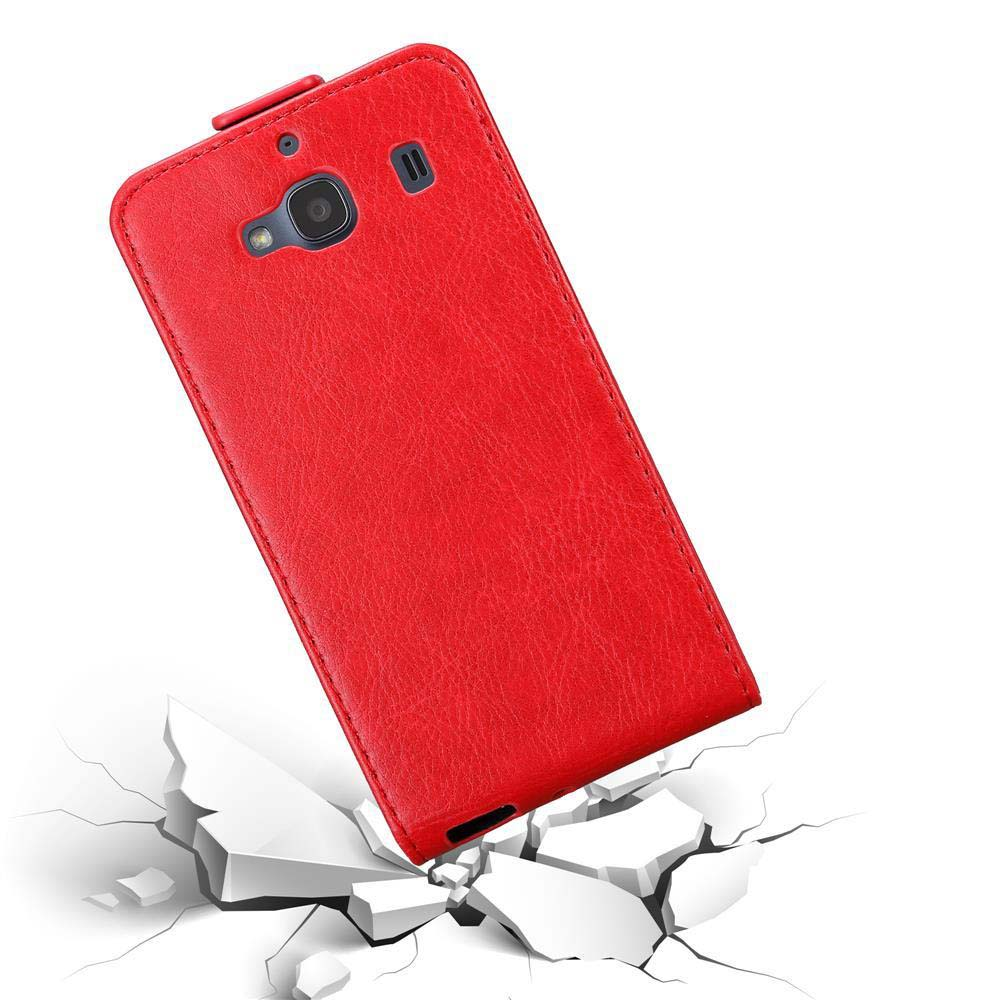 Custodia rossa per telefono su cemento rotto, angolata, che mostra la protezione dalle cadute.