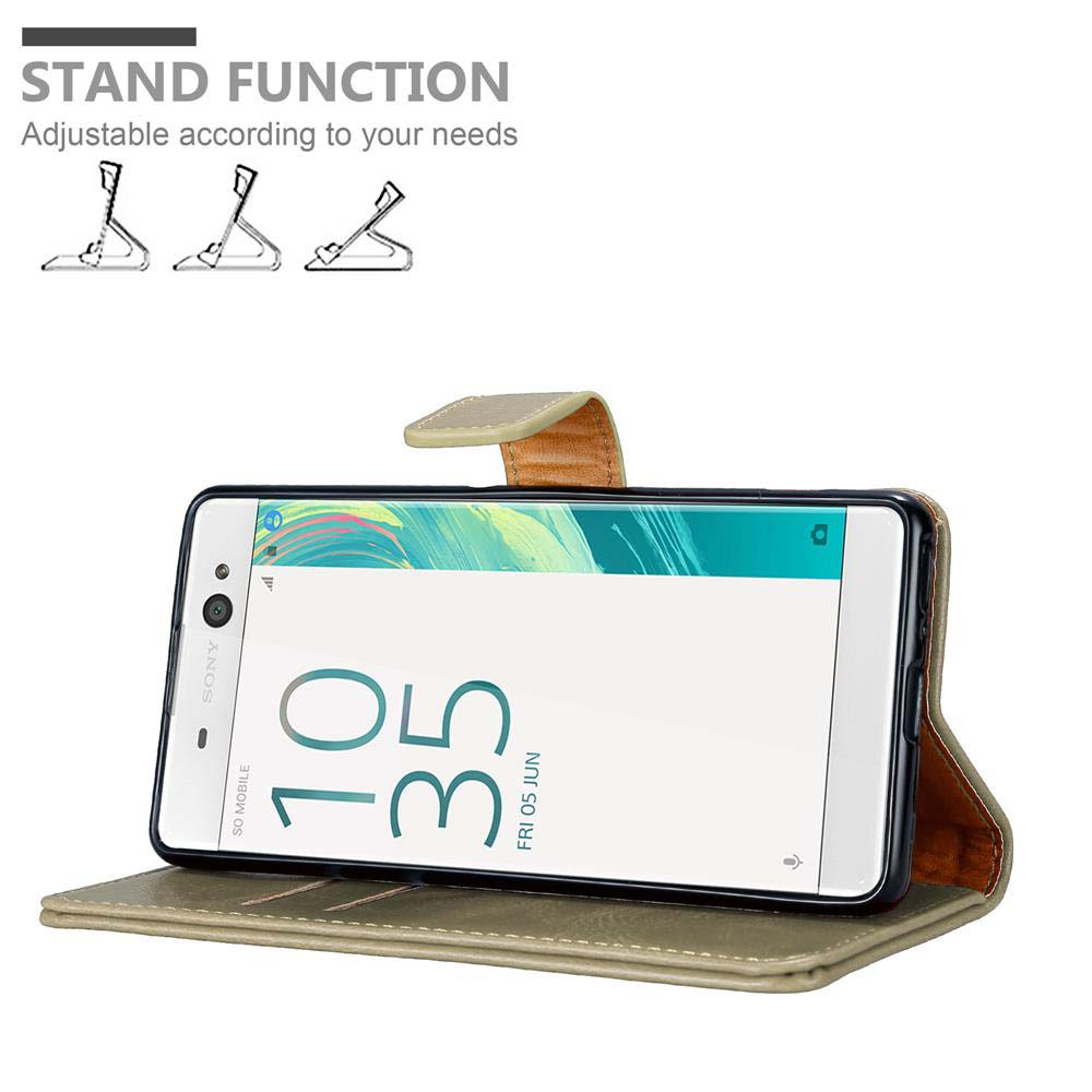 Teléfono en una funda con función de soporte. El teléfono muestra la hora y la fecha.