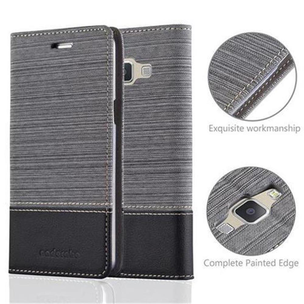 Se muestran dos fundas de teléfono grises. Los detalles de la funda incluyen una mano de obra exquisita y un borde pintado.