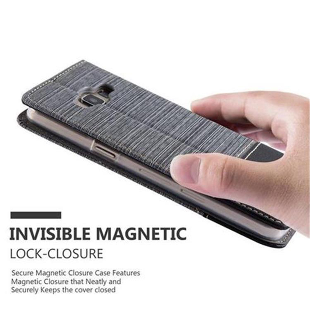 Mano sosteniendo funda gris con cierre magnético, texto: cierre magnético invisible. La funda está abierta.