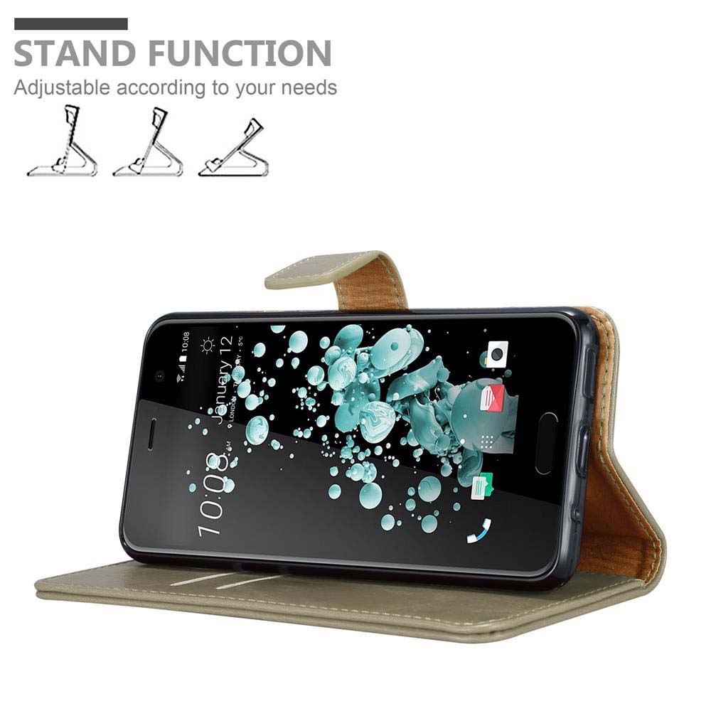Telefono in una custodia a portafoglio, rialzato. Testo: Funzione stand, regolabile in base alle tue esigenze.