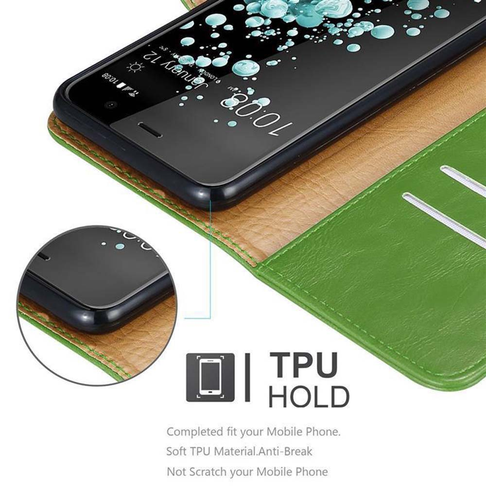 Telefono in una custodia in pelle verde. TPU HOLD è scritto nell'immagine.