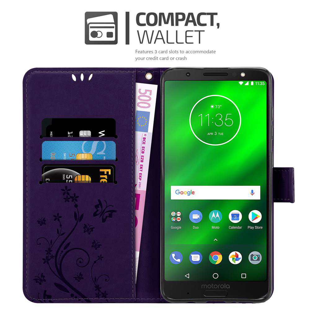 Custodia per telefono con un telefono all'interno. Include slot per carte e denaro. La custodia è viola con un motivo floreale.