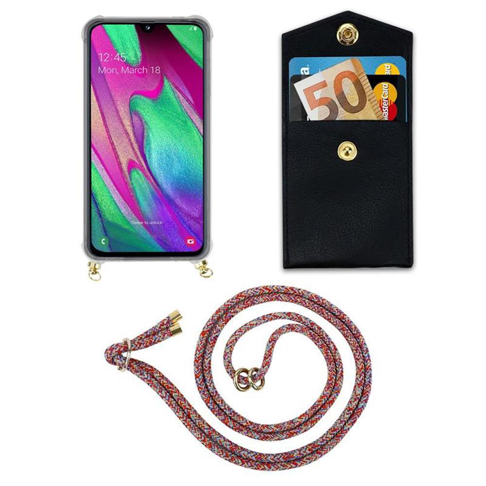 Smartphone mit Schlüsselband, Bargeld und Karten in kleiner schwarzer Geldbörse.