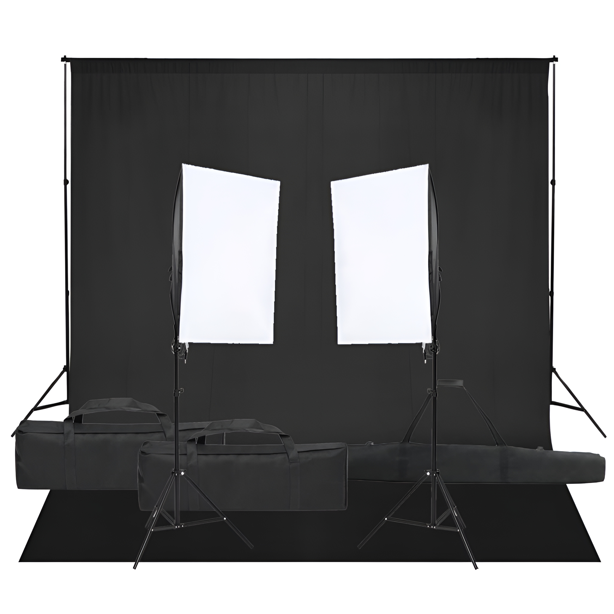 Studio-Setup mit schwarzem Hintergrund, zwei Softboxen und Taschen. Stative sichtbar.