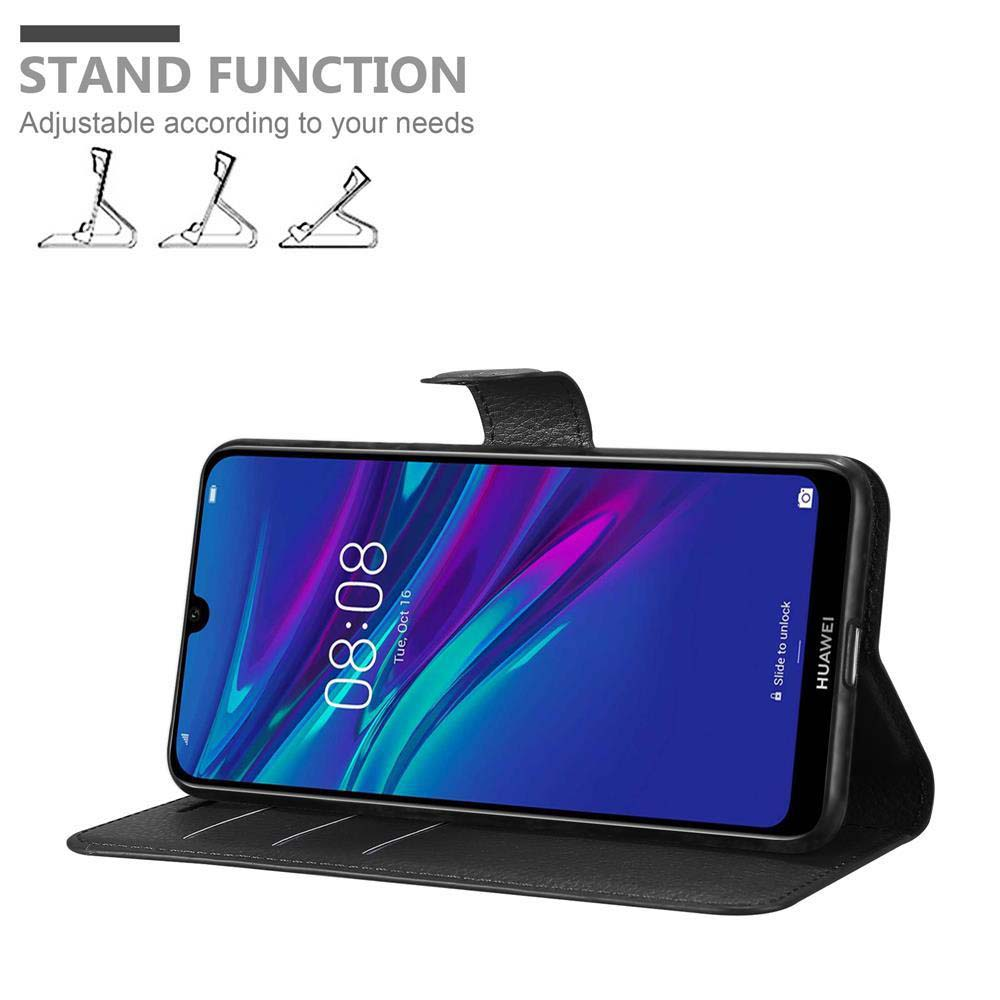 Telefono in custodia con supporto, visualizza ora e data. La custodia è nera, con coperchio e supporto.