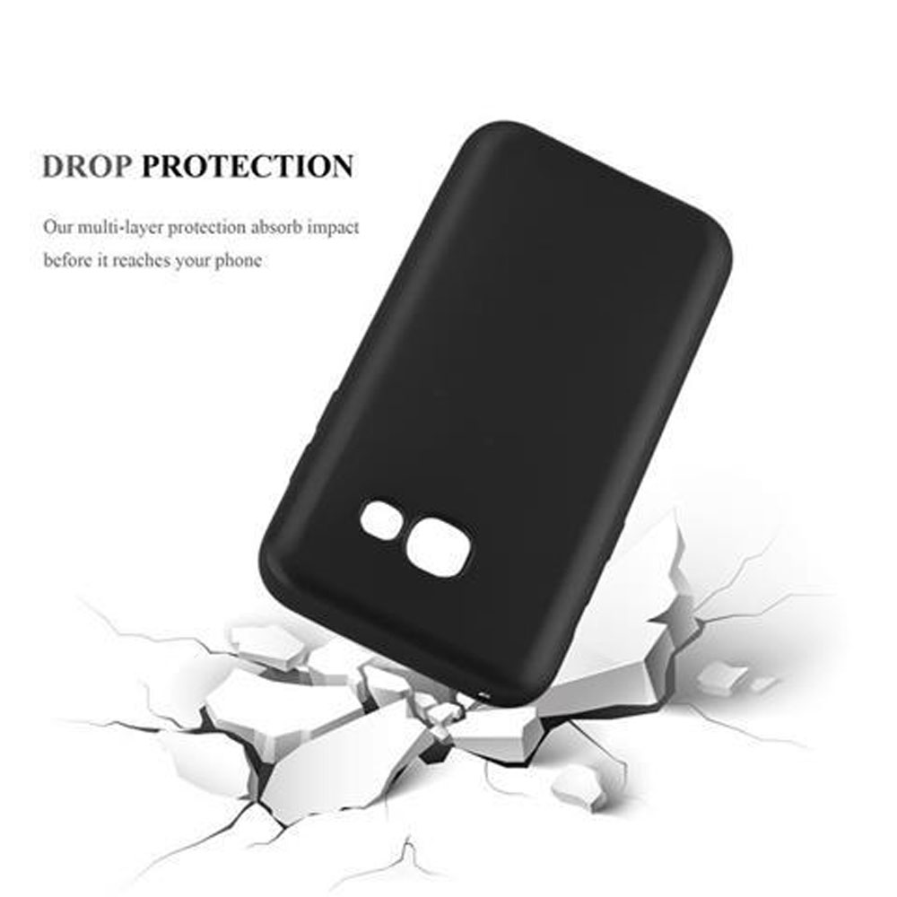 La imagen muestra una funda de teléfono negra siendo probada, rompiendo el suelo, enfatizando la protección contra caídas.