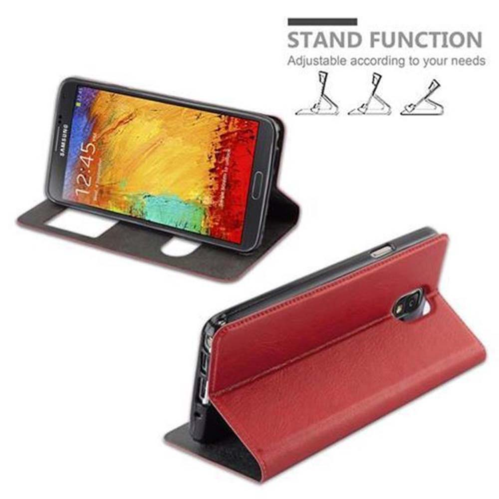 Un teléfono en una funda roja se muestra en dos posiciones, abierto y en posición vertical, promoviendo una función de soporte.