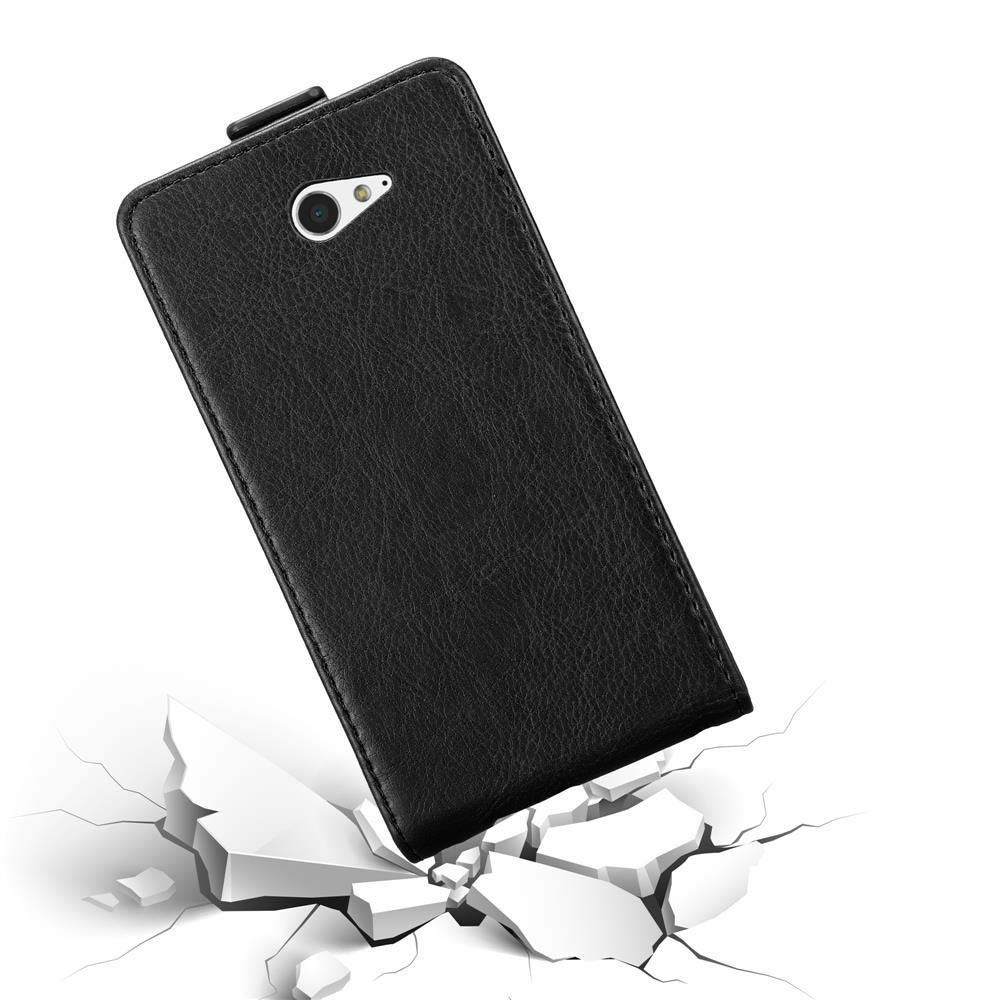 Funda negra para teléfono con teléfono dentro, mostrando una superficie agrietada debajo.