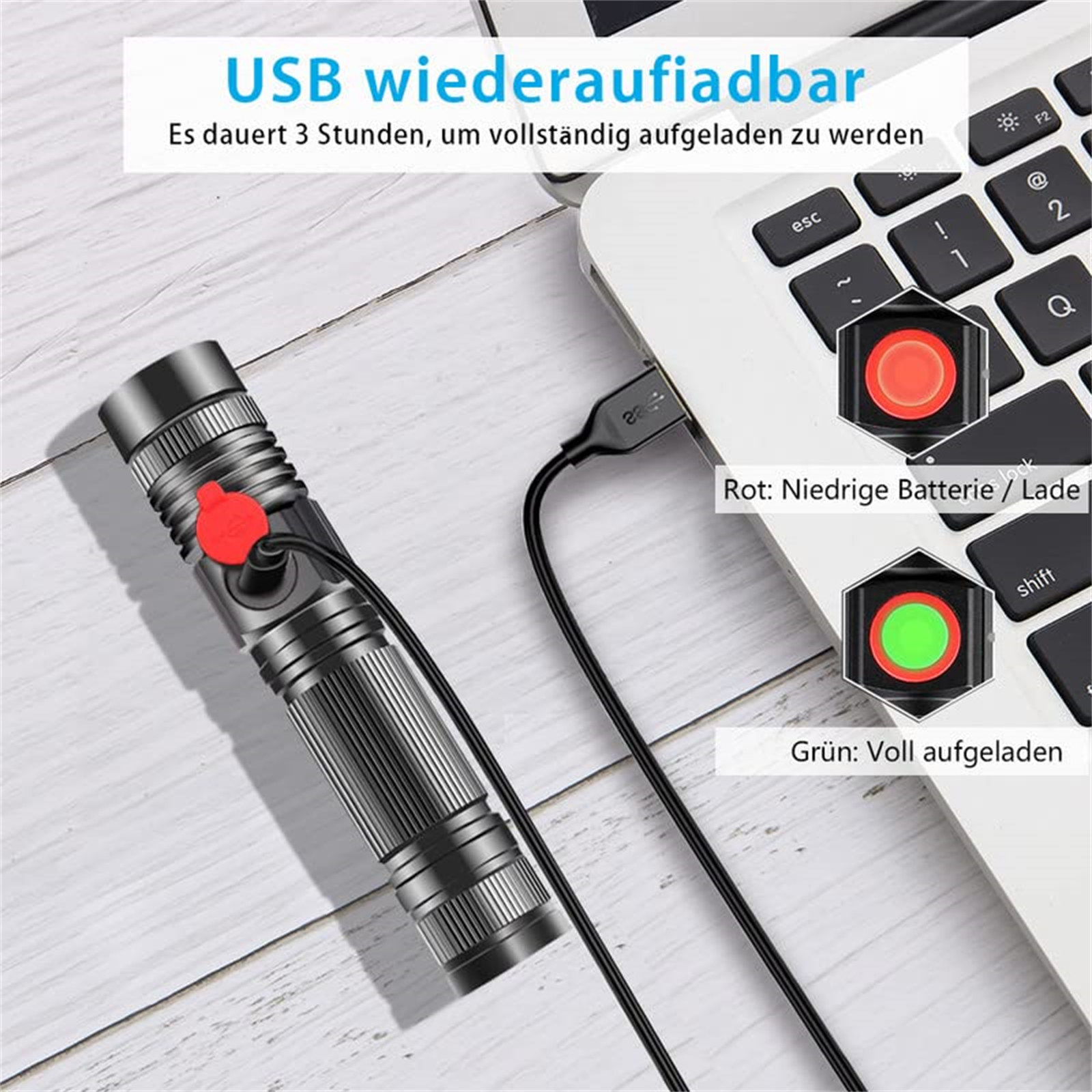 Schwarze Taschenlampe, die über ein USB-Kabel an einer Laptop-Tastatur geladen wird.