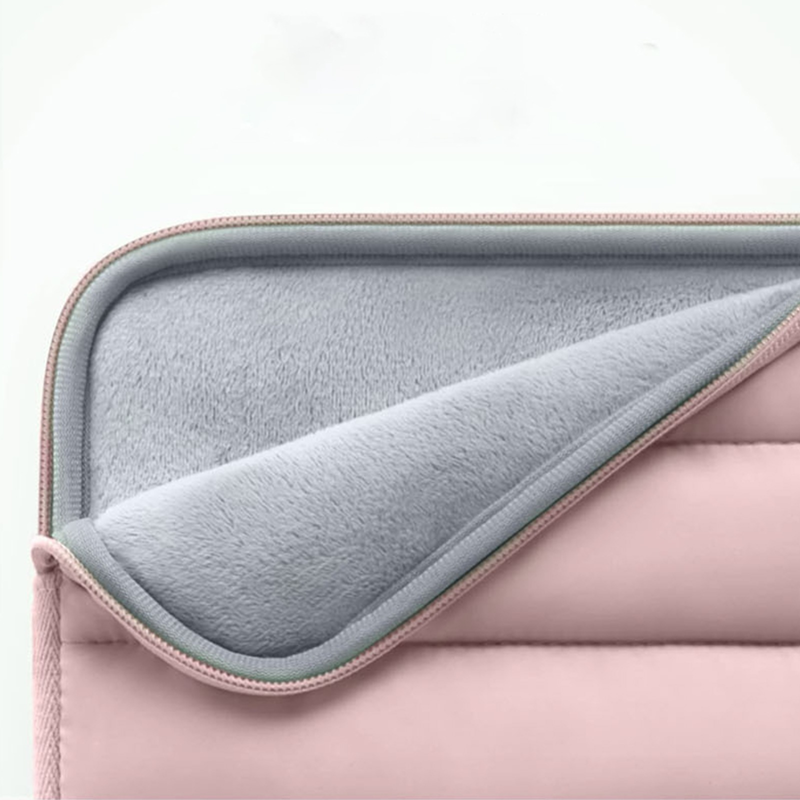 Rosa Laptoptasche mit weichem grauem Innenraum. Der Reißverschluss ist sichtbar.