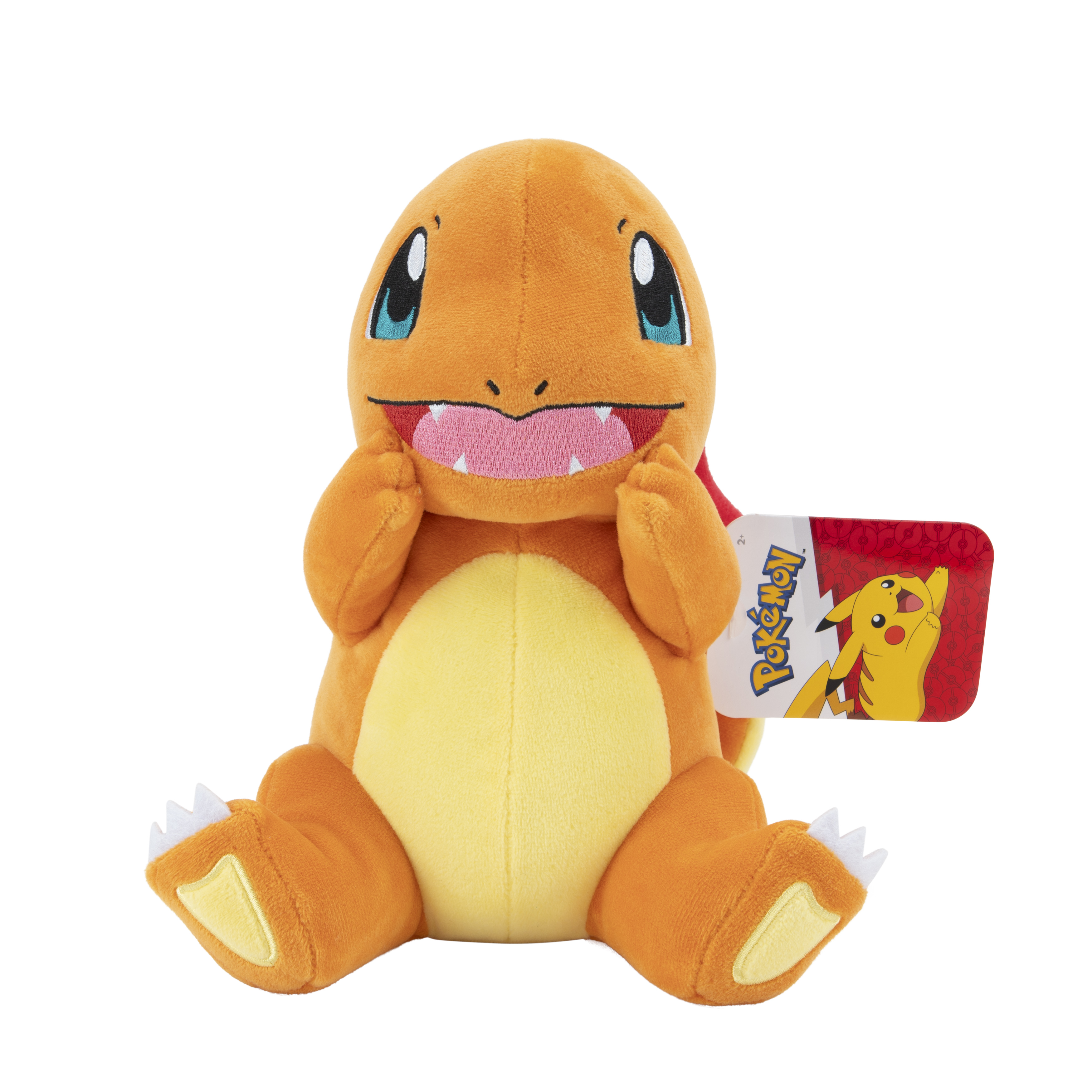 Charmander-Plüschtier, orange mit gelbem Bauch und blauen Augen, Etikett angebracht.