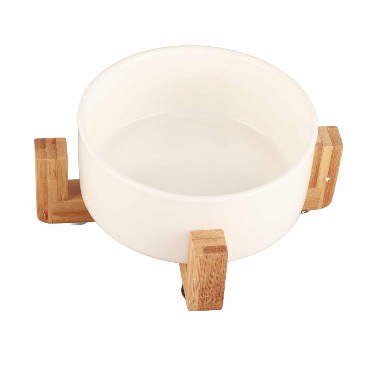 Eine weiße Keramikschale auf einem Holzständer mit drei Beinen.