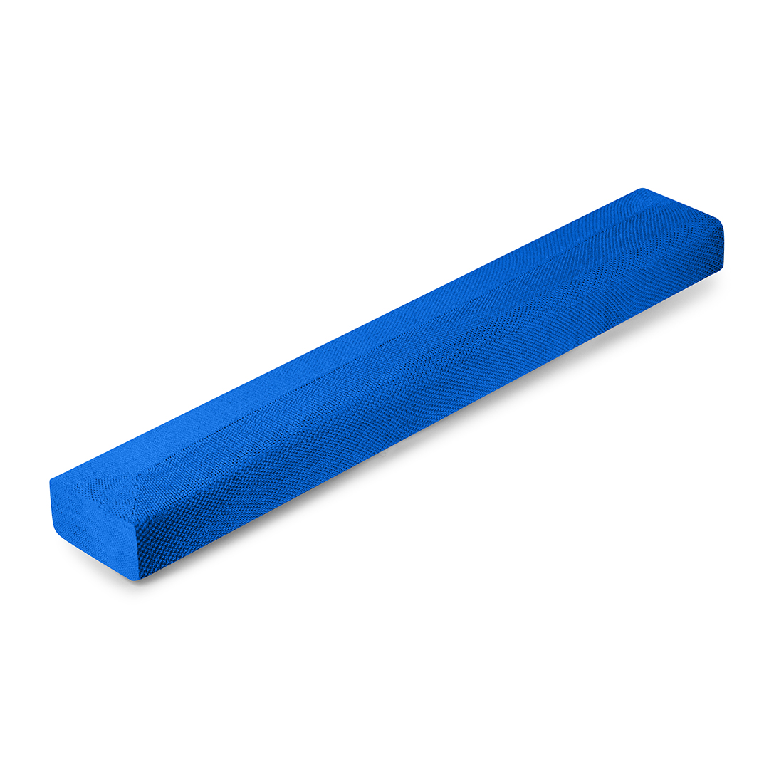Une longue barre de son bleue sur une surface blanche, vue d'un angle.