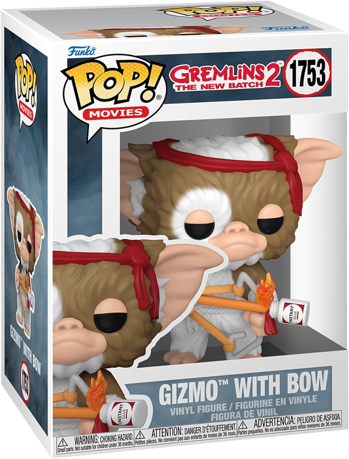 Una caja Funko Pop! de Gizmo de Gremlins 2, con arco y flecha. Gizmo sostiene palos y una botella.