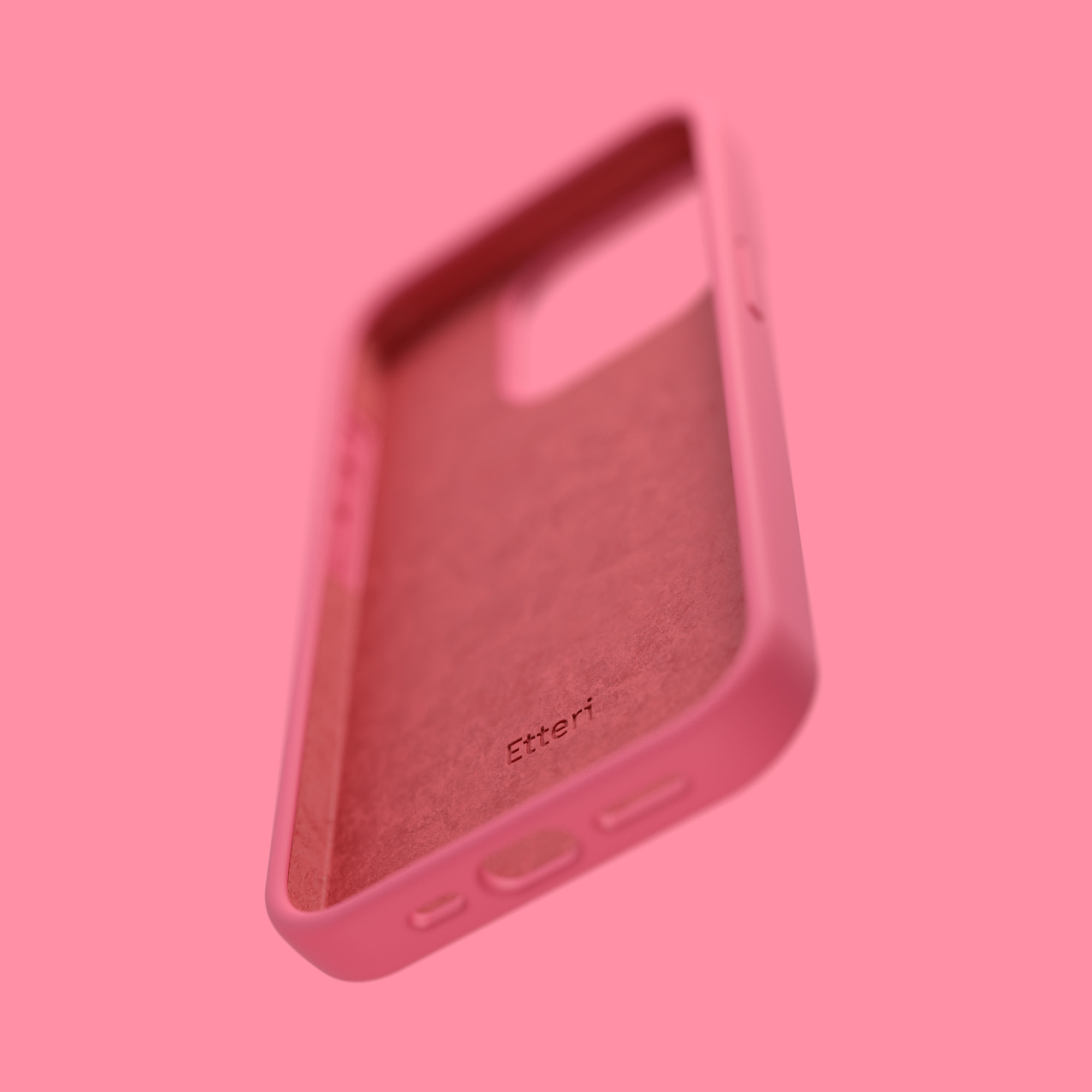 Różowe etui na telefon z napisem 'Etteri' w środku, na różowym tle.
