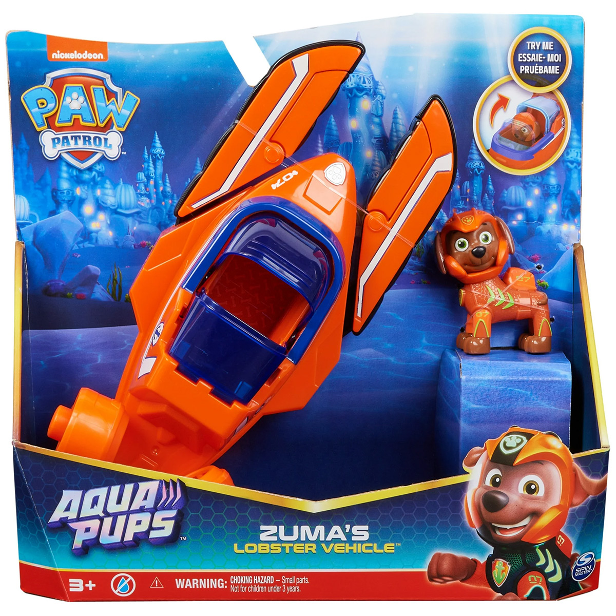 Giocattolo Paw Patrol Zuma's Lobster Vehicle in una scatola. Colori arancione e blu. Sfondo bianco.